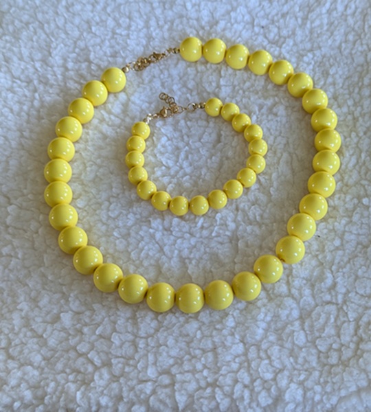 Set A ketting 14 - armband 10 mm acryl geel